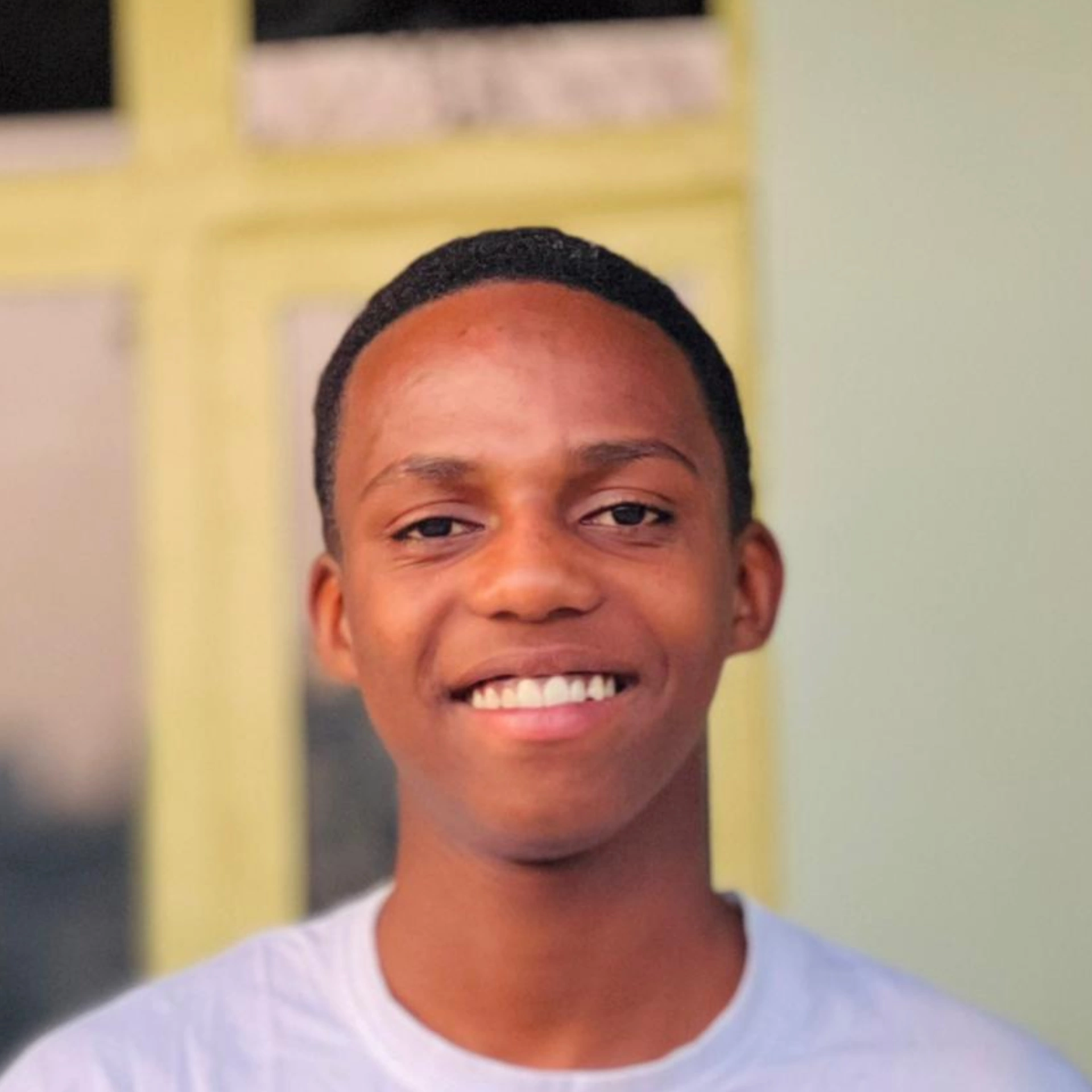 Kabuye Ayubu face close-up smiling